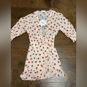 Wrap dress with ruffled edges